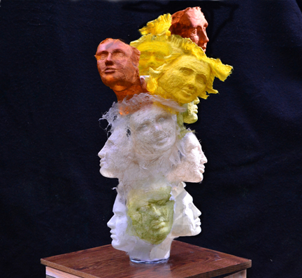 Paper Sculpture of People bursting into Life paper one sheet thick realistic lifelike