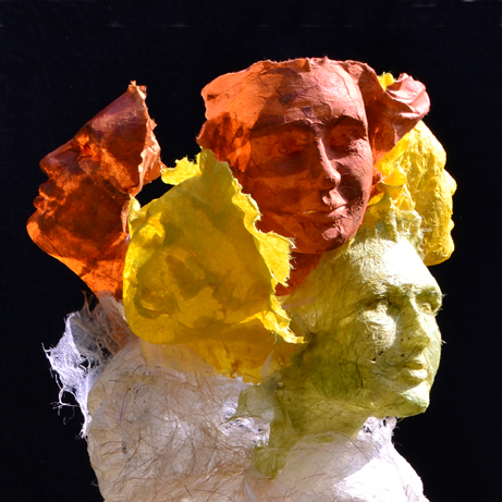 Paper Sculpture Life size faces bursting into life realistic lifelike