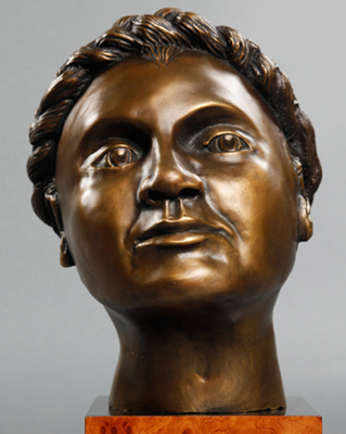 Traditional bronze bust of mature woman portraying her character and mood of hope