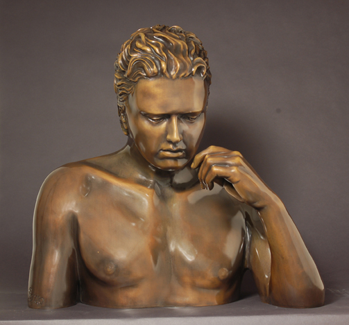 bronze sculpture of young man lost in thought corporate commission site specific realistic figurative traditional classic bronze sculpture