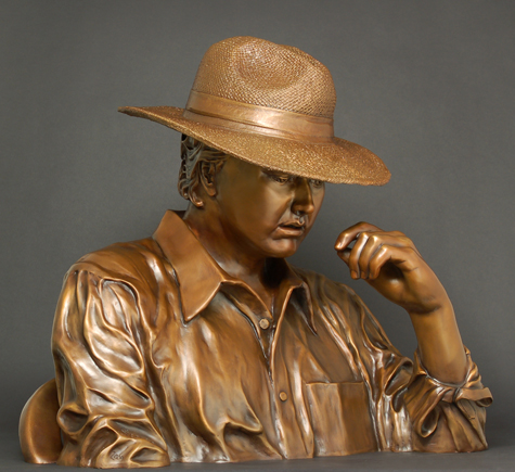 Detailed Bronze Sculpture statue in classic style of a youth in a relaxed mood